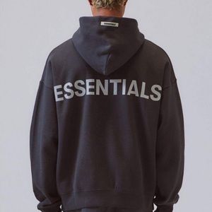 Black fog essentials hoodie with reflective back writing